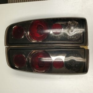 1999-2004 Ford F250 Taillights Pair (Aftermarket) - slight chip on one of them